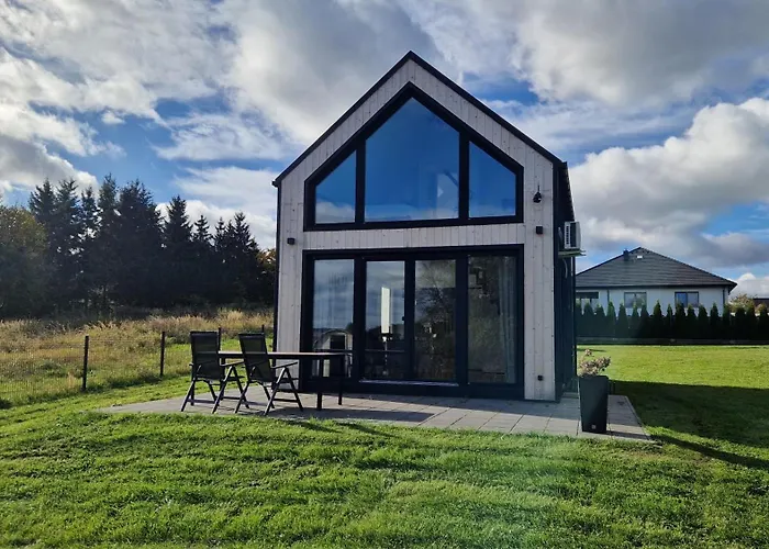 Деревянный коттедж Maxim Nad Jeziorem *